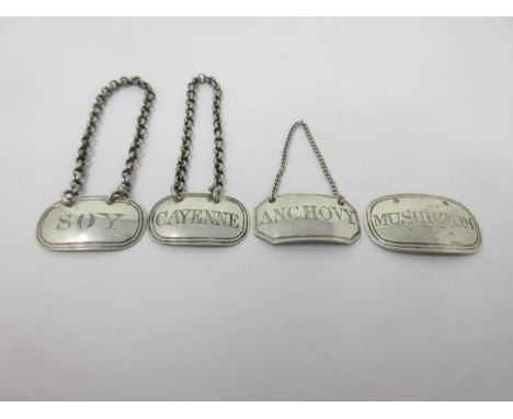 A pair of Victorian silver small oval Labels, Soy and Cayenne, London 1845, maker: Rawlings &amp; Summers, and two others, An