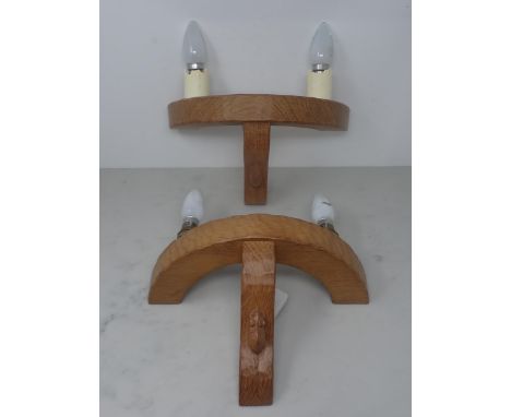 Robert Mouseman Thompson. A pair of adzed oak Wall Lights with mouse signatures, 12 1/4 in W x 7 1/2 in H 