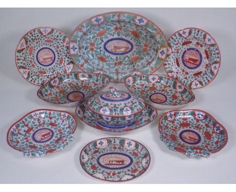 An early 19th Century and later pearl/creamware part Dinner Service, painted central stylised animals surrounded by flowers a