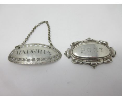 A George III silver oval Label, Madeira, London 1817, maker: Charles Rawlings, and another Port, Birmingham 1848, maker: J.G.