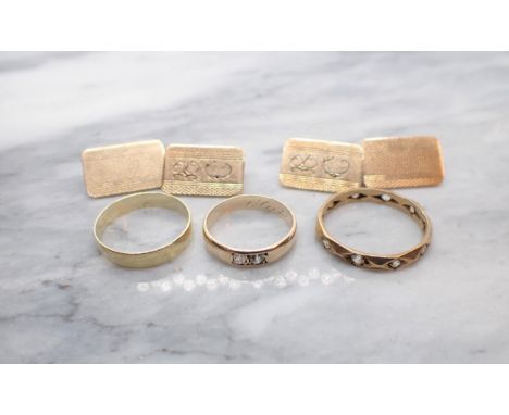 A gold Band pavé-set two old-cut diamonds, ring size F, unmarked, untested, approx 1.50gms, a 9ct gold Wedding Band, ring siz