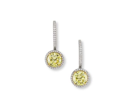 BOODLES: COLOURED DIAMOND AND DIAMOND PENDENT EARRINGS, 2011Each brilliant-cut Fancy Intense Yellow diamond, weighing 2.63 ca