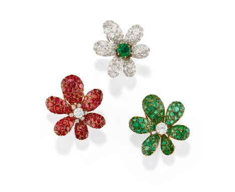 THREE EMERALD, RUBY AND DIAMOND BROOCHES, CIRCA 1965The bombé petals pavé-set with circular-cut emeralds or rubies, accented 