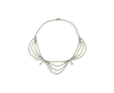 BELLE ÉPOQUE SEED PEARL AND DIAMOND-SET NECKLACE, CIRCA 1905Each pear-shaped diamond drop suspended from an old brilliant-cut