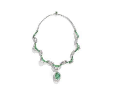 EMERALD AND DIAMOND PENDANT NECKLACE, CIRCA 1970The detachable pendant set with a pear-shaped emerald, weighing 17.73 carats,