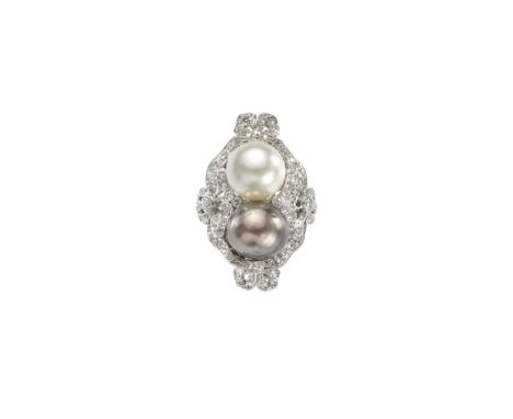 NATURAL PEARL AND DIAMOND PLAQUE RING, CIRCA 1905The 9.7-9.9 x 8.6mm pearl of grey tint and 9.5 x 9.2mm pearl of cream tint, 