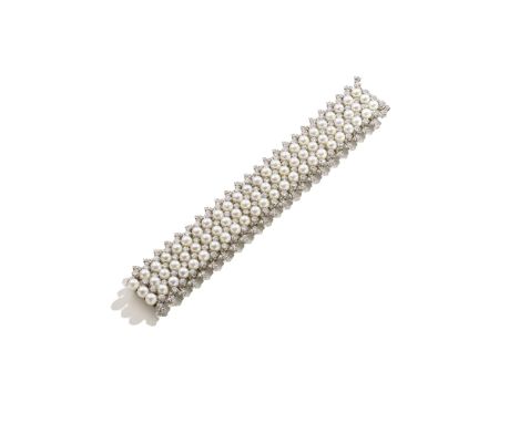 JEAN SCHLUMBERGER FOR TIFFANY: CULTURED PEARL AND DIAMOND BRACELET, CIRCA 1965Set with alternating rows of cultured pearls an