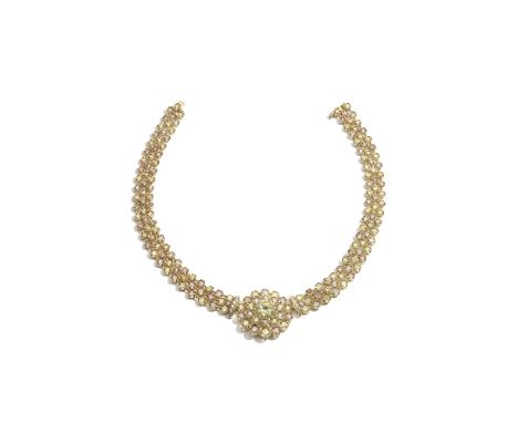 DIAMOND AND COLOURED DIAMOND NECKLACESet with a brilliant-cut diamond of yellow tint, weighing 8.07 carats, within a surround