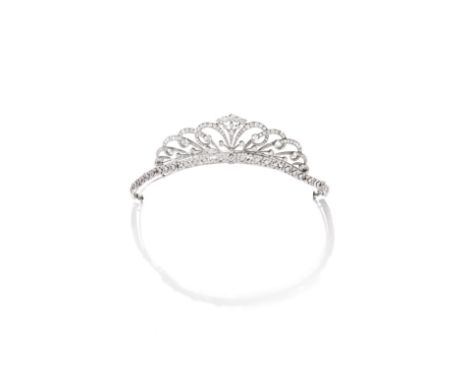 DIAMOND TIARA, KNOWN AS 'THE ROCKINGHAM TIARA', CIRCA 1900The openwork scrolls with knifewire detail, graduating in size towa