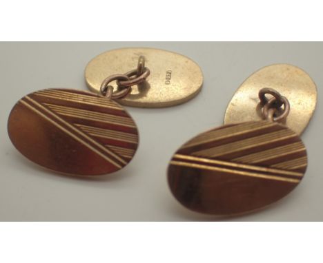 Pair of 9ct yellow gold gents cufflinks with engine turned design 9.8g