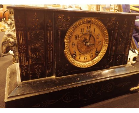 Antique lacquered steel cased chiming mantel clock dial with rams head ornate decoration and feet