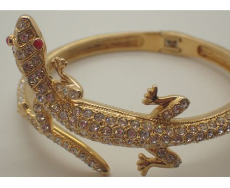 Costume jewellery diamante set yellow metal lizard bangle