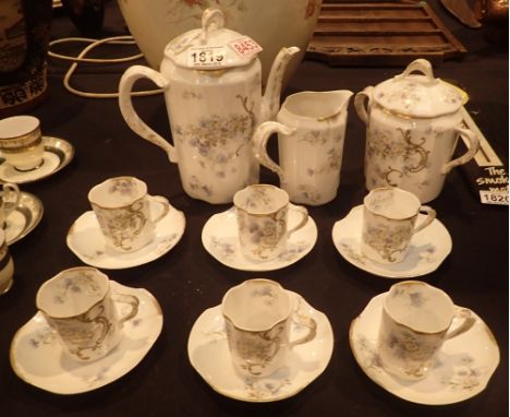 Unmarked French Limoges antique coffee set hand packed floral design with gilding six cans coffee pot sugar saucers and cream