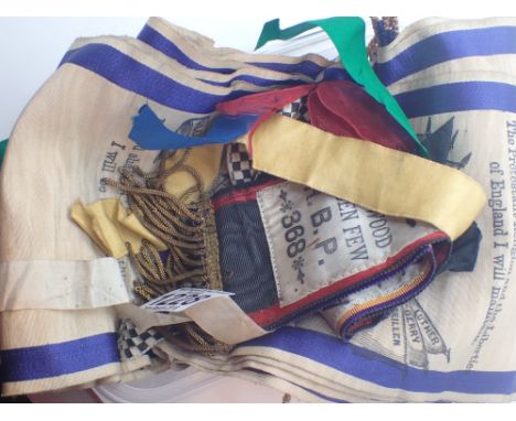Orange Lodge sash and a Garswood Chosen Few sash