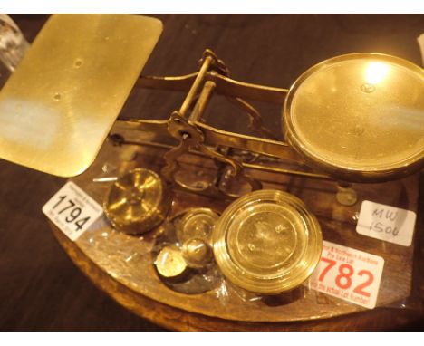 Pair of Edwardian postal scales and brass weights