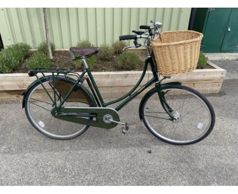 The Princess bike is a British made Lady's bike. Fitted with a combination of enameled, hand-lined mudguards and rear skirtgu