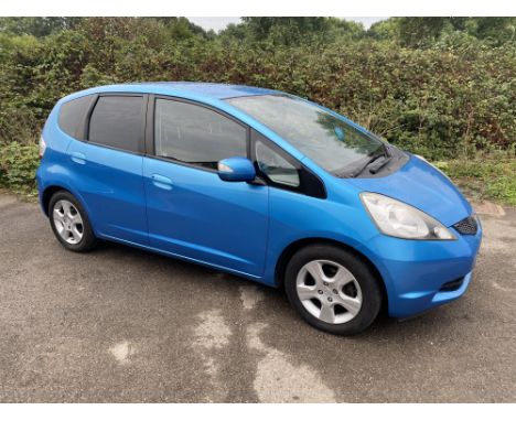 Honda Jazz 1.4 ES Manual. Registration: NU59 FKX. Mileage: 75,378. Finished in metallic blue with grey cloth interior, 5 spee