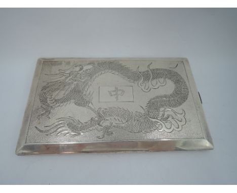 A Chinese silver cigarette case of rectangular form having engraved dragon decoration to front with Mahjong Red Dragon emblem