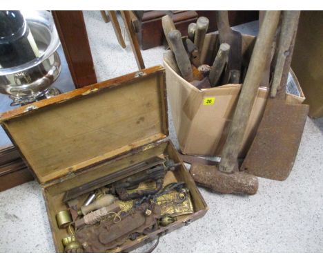 A selection of vintage tools to include a sledge hammer, hammers, door accessories and other items