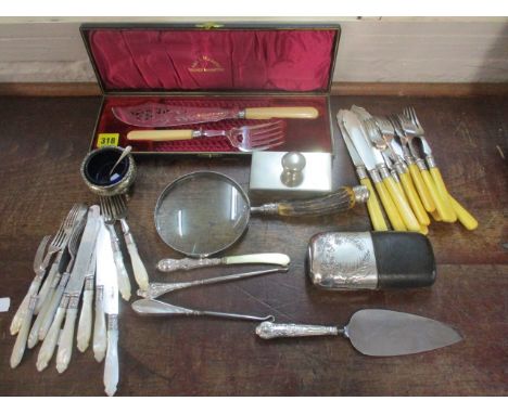 Silver and silver plate to include a horn handled magnifying glass, a hip flask, fish knives and forks, dessert knives and fo