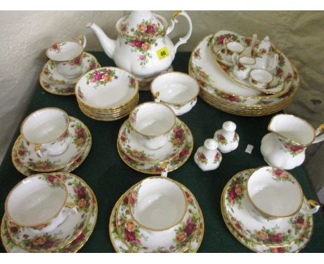 A Royal Albert Old Country Roses part tea service, together with a matching miniature child's tea service