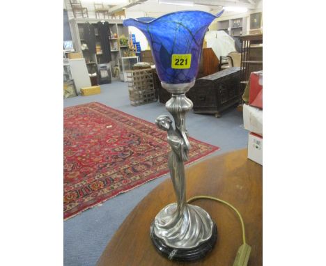 A modern Art Nouveau style, cast metal figure lamp with a blue glass shade, 18 1/2 h