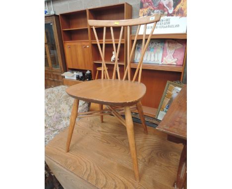 An Ercol dining chairAll legs etc seem secure, wear and tear see picsFair condition, few marks to the top