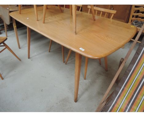 An Ercol dining table75cm W x 152cm L x 72cm H 