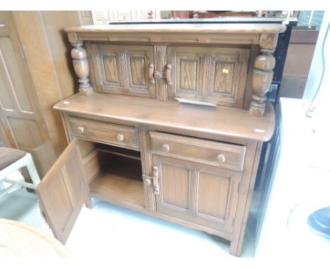 A 1990s Ercol old colonial sideboard