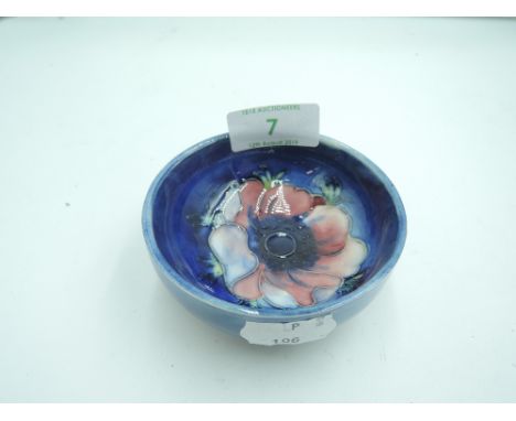 A small ceramic bowl by Moorcroft 