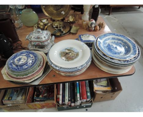 A selection of ceramic plates various ages and designs