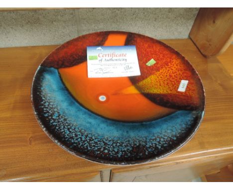 A large ceramic charger plate or dish by Poole designer Alan Clarke limited run no.013CONDITION REPORT - 42CM CHARGER NUMBER 