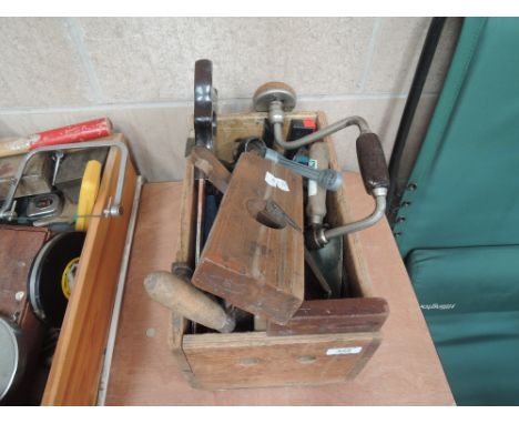 A selection of tools including vintage planes