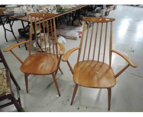 Two Ercol carver dining chairs