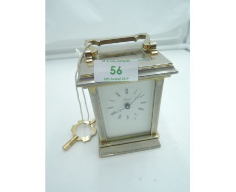 An Angelus carriage clock 11 jewel 