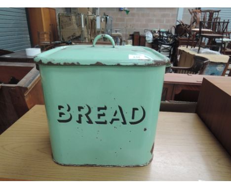 A vintage enamelled bread bin