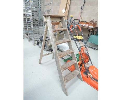 A set of wooden step ladders