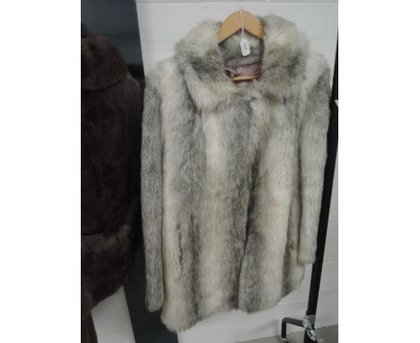 Ladies vintage faux fur coat in good condition.