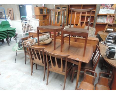 A vintage teak G plan dining table and 6 chairs
