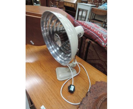 A vintage Pifco Infra Red heat lamp