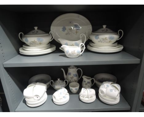 A part tea and dinner service by Wedgwood in the Ice Rose designOne cup has hairline crack, no visible marks on plate, needs 