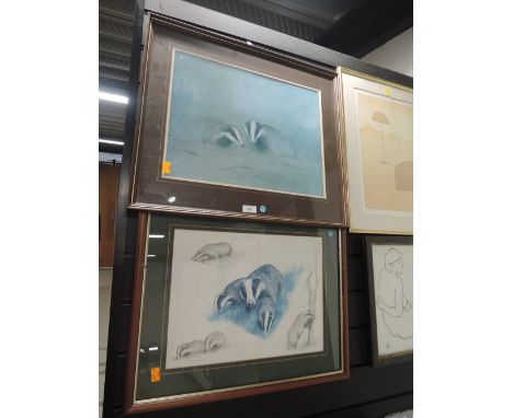 Two prints of badgers and sett