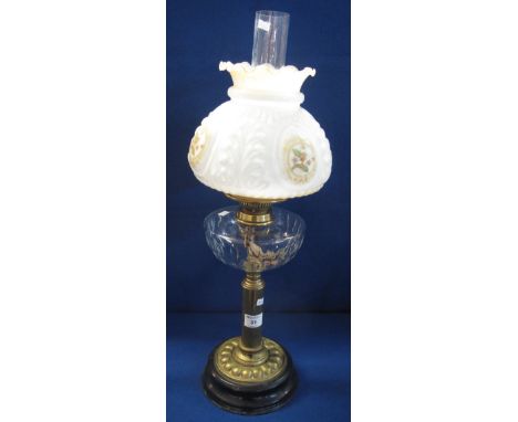 Early 20th Century double burner oil lamp with thumb cut glass reservoir on brass pedestal with ceramic base, clear chimney a