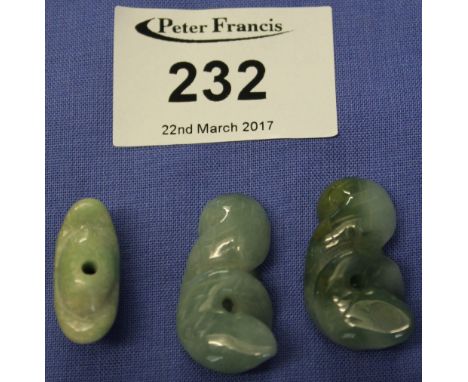 Three Netsuke type jade items. (3)
