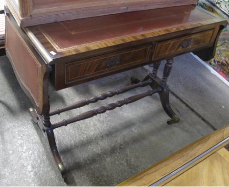 Reproduction mahogany sofa table with leather inset top.