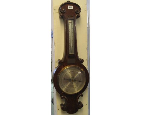 Negretti and Zambra, London, 28412 wall barometer and thermometer with silvered face, in a oak case.