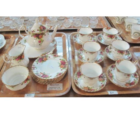 Two trays of Royal Albert bone china 'Old Country Roses' teaware comprising: teacups and saucers; teapot; plates; milk jug an