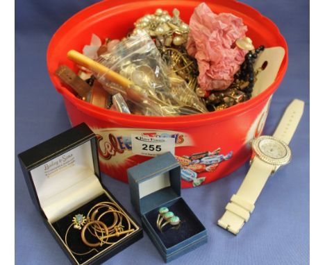 Tub of assorted costume jewellery, wristwatches, loose cutlery, chess figure etc.