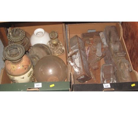 Tray of assorted vintage tools to include: axe; chisel; planes etc., together with another tray of various double oil burners