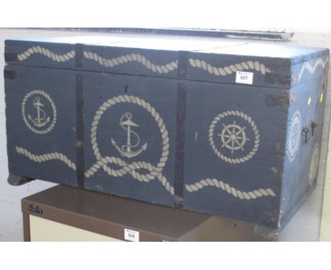 Vintage painted pine trunk with carrying handles and painted marine decoration.